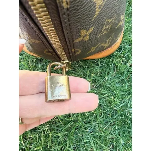 Louis Vuitton Alma Monogram Canvas Handbag Vintage Authentic Lock